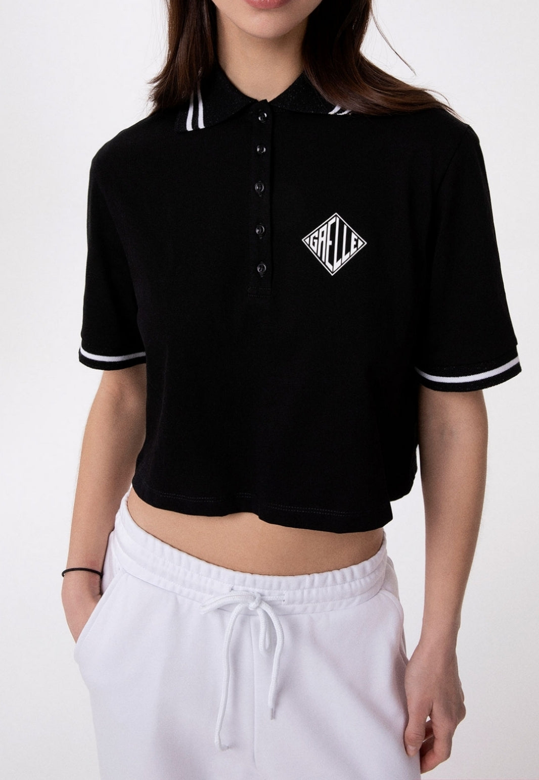 Gaelle Paris GAABW09320 polo cropped nera righe